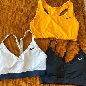 Nike women’s sports bra, black white and yellow, lightly worn, Sz small